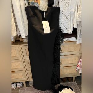Likely black feathered evening dress